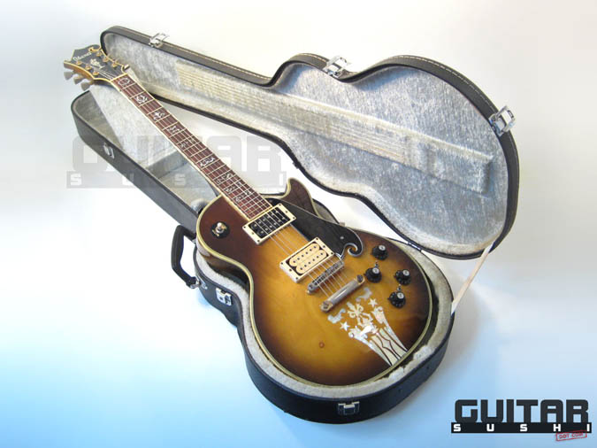 Vintage 1974 Ibanez Custom Agent Model 2405
Classic Pre-Serial Collectible Japanese Les Paul Style Lawsuit Era Electric Guitar with Urn Inlay Headstock, Creme Super 70 & Black DiMarzio pickups, and includes Hardshell Case [GUITAR SUSHI] Maintaining a wide-stance since 2006 | www.guitarsushi.com