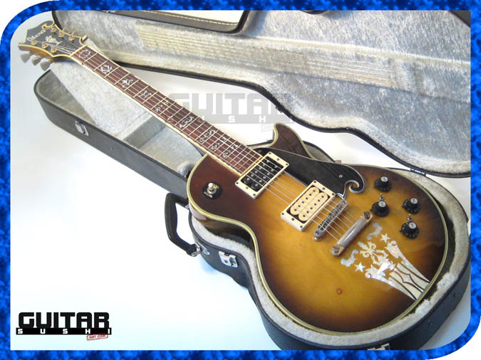 more photos below: Vintage 1974 Ibanez Custom Agent Model 2405
Classic Pre-Serial Collectible Japanese Les Paul Style Lawsuit Era Electric Guitar with Urn Inlay Headstock, Creme Super 70 & Black DiMarzio pickups, and includes Hardshell Case [GUITAR SUSHI] Maintaining a wide-stance since 2006 | www.guitarsushi.com