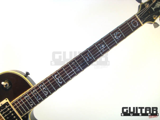 Vintage 1974 Ibanez Custom Agent Model 2405
Classic Pre-Serial Collectible Japanese Les Paul Style Lawsuit Era Electric Guitar with Urn Inlay Headstock, Creme Super 70 & Black DiMarzio pickups, and includes Hardshell Case [GUITAR SUSHI] Maintaining a wide-stance since 2006 | www.guitarsushi.com