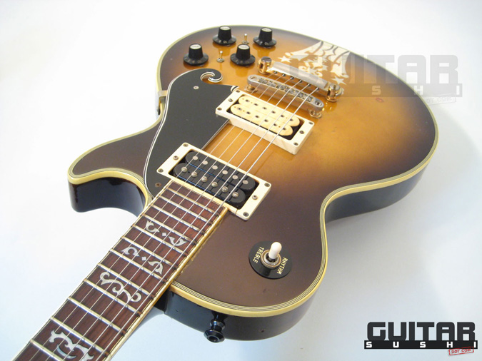 Vintage 1974 Ibanez Custom Agent Model 2405
Classic Pre-Serial Collectible Japanese Les Paul Style Lawsuit Era Electric Guitar with Urn Inlay Headstock, Creme Super 70 & Black DiMarzio pickups, and includes Hardshell Case [GUITAR SUSHI] Maintaining a wide-stance since 2006 | www.guitarsushi.com