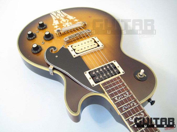 Vintage 1974 Ibanez Custom Agent Model 2405
Classic Pre-Serial Collectible Japanese Les Paul Style Lawsuit Era Electric Guitar with Urn Inlay Headstock, Creme Super 70 & Black DiMarzio pickups, and includes Hardshell Case [GUITAR SUSHI] Maintaining a wide-stance since 2006 | www.guitarsushi.com